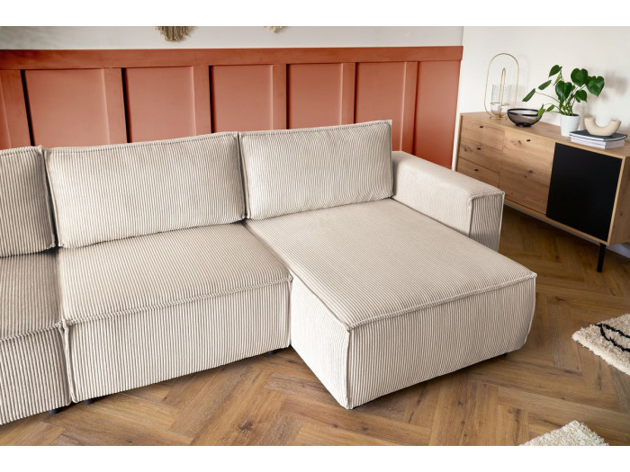 Vue latérale du canapé Nihad beige strié montrant les modules assemblés.