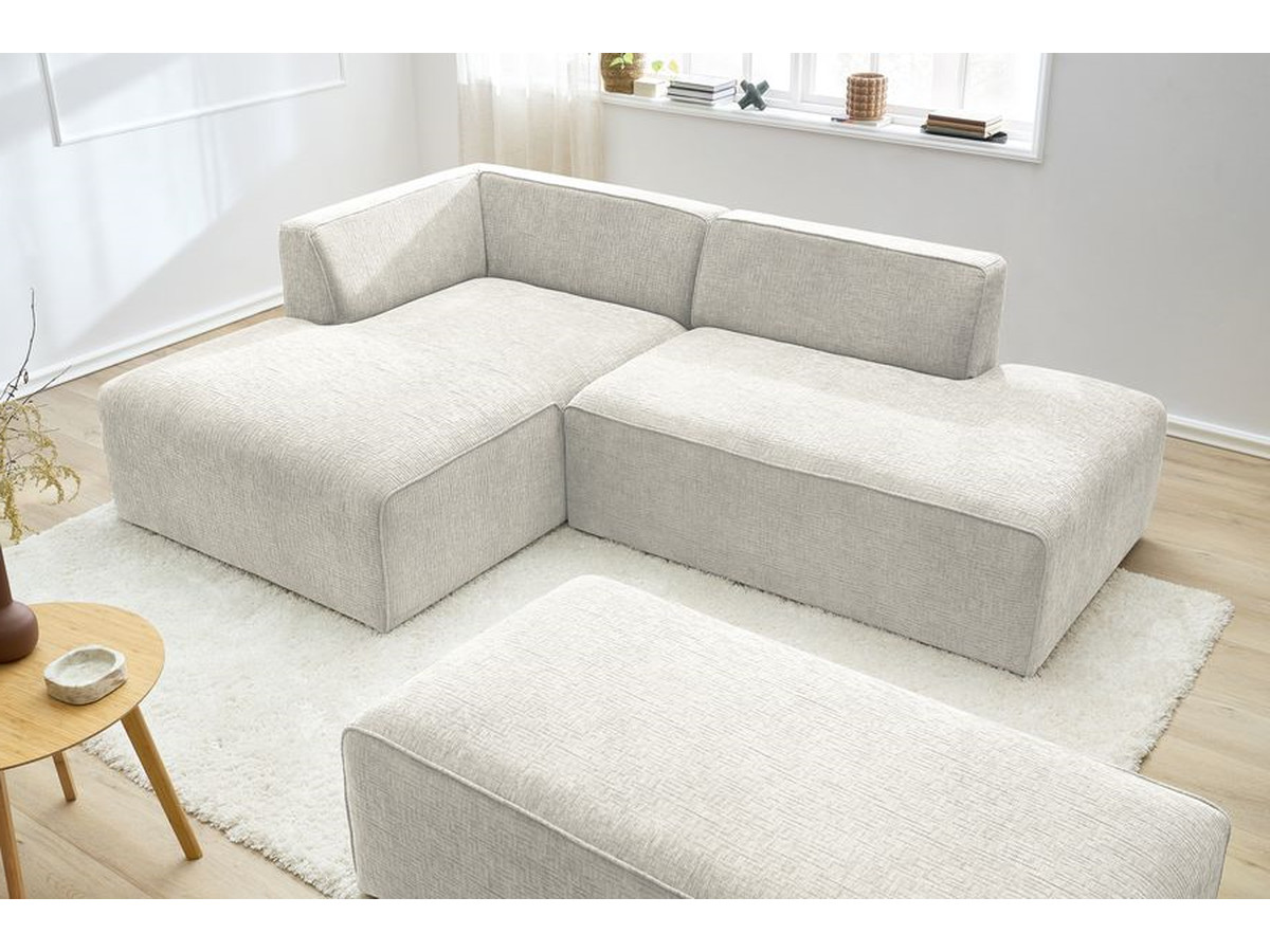 Canapé d'angle fixe modulable MEGEVE tissu texturé avec pouf