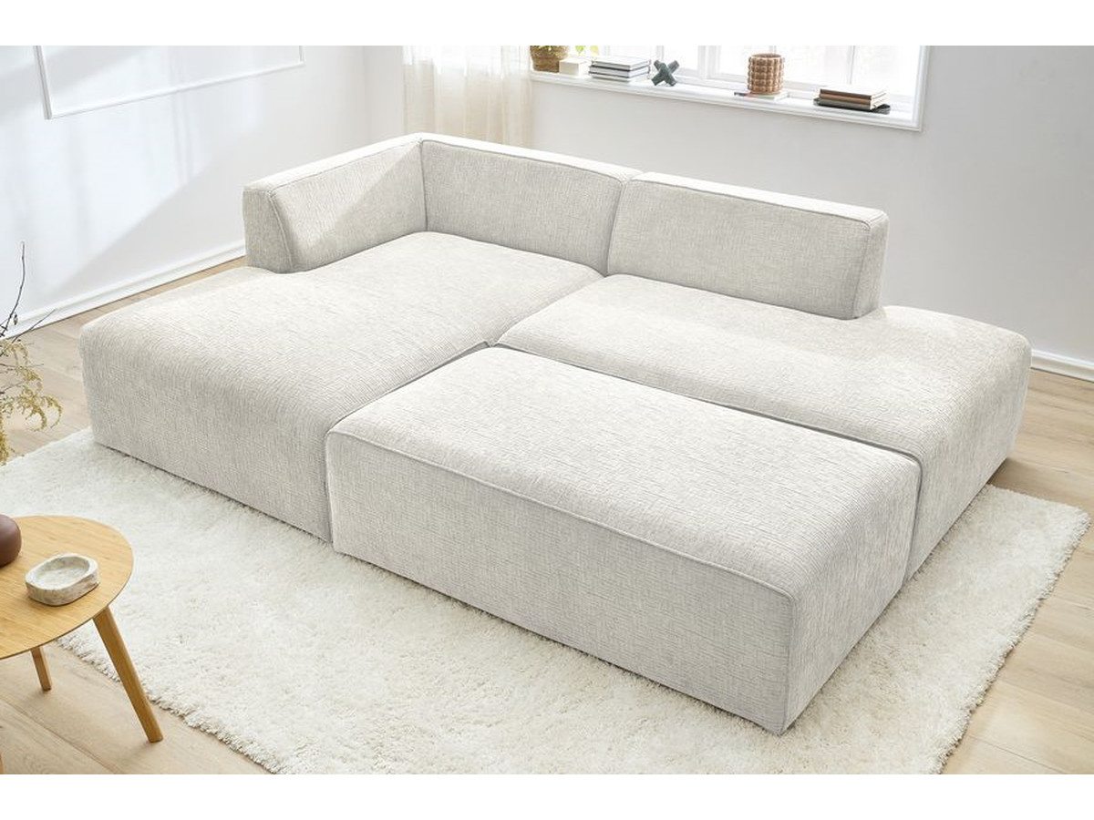 Canapé d'angle fixe modulable MEGEVE tissu texturé avec pouf