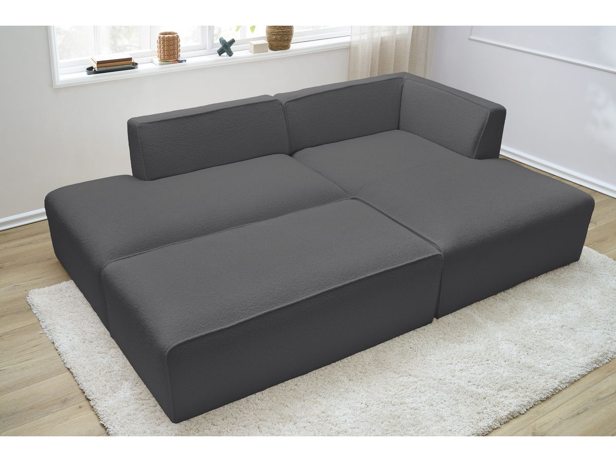 Canapé d'angle fixe modulable MEGEVE tissu bouclette avec pouf