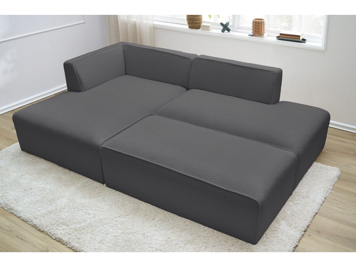 Canapé d'angle fixe modulable MEGEVE tissu bouclette avec pouf