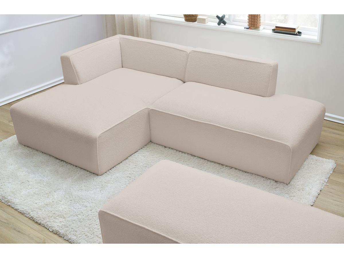 Canapé d'angle fixe modulable MEGEVE tissu bouclette avec pouf