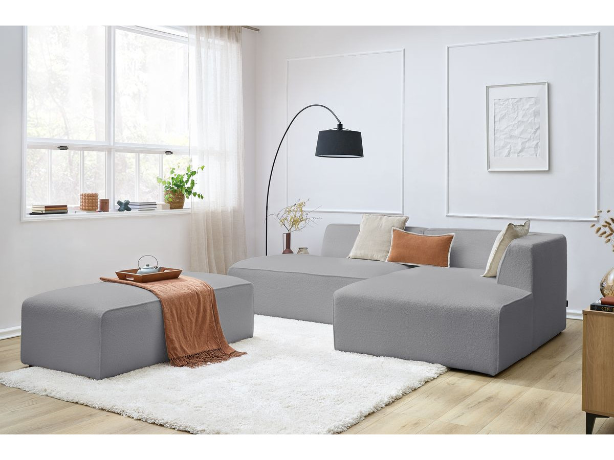 Canapé d'angle fixe modulable MEGEVE tissu bouclette avec pouf