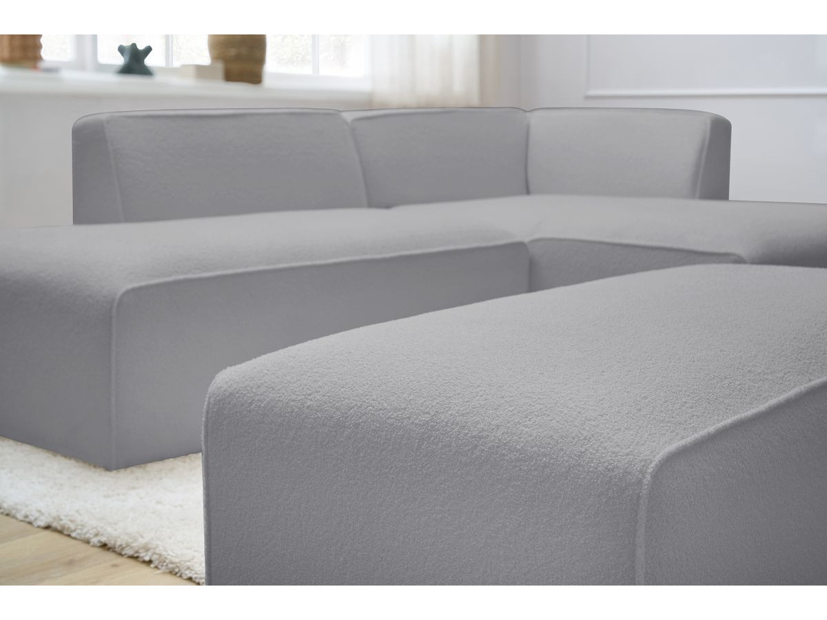 Canapé d'angle fixe modulable MEGEVE tissu bouclette avec pouf