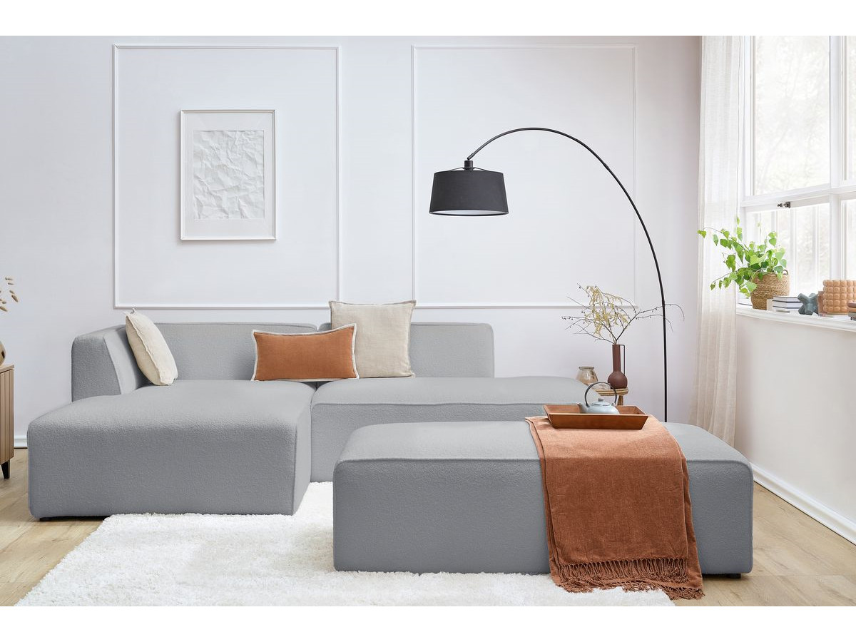 Canapé d'angle fixe modulable MEGEVE tissu bouclette avec pouf