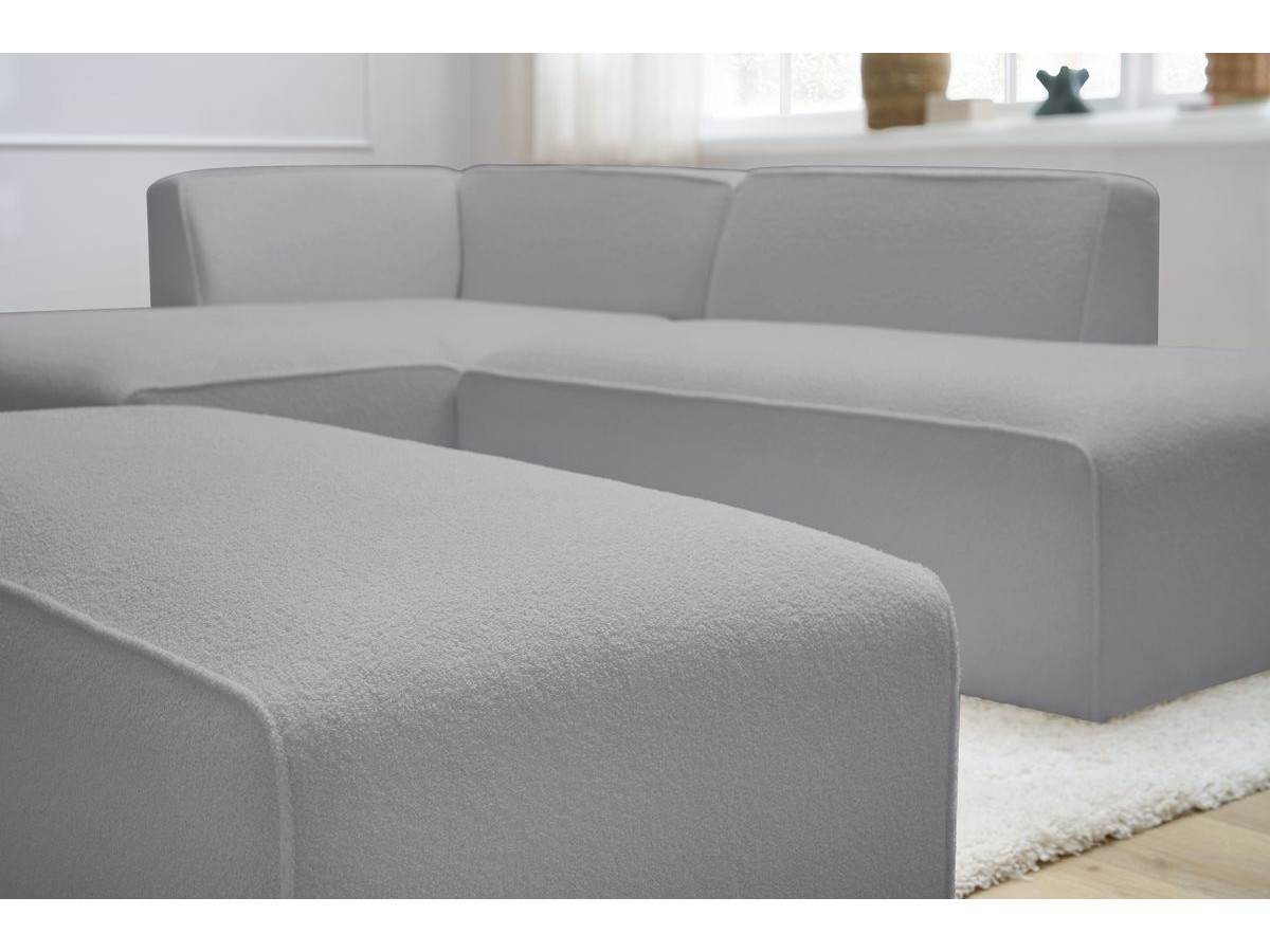 Canapé d'angle fixe modulable MEGEVE tissu bouclette avec pouf