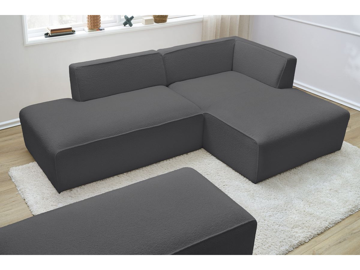 Canapé d'angle fixe modulable MEGEVE tissu bouclette avec pouf