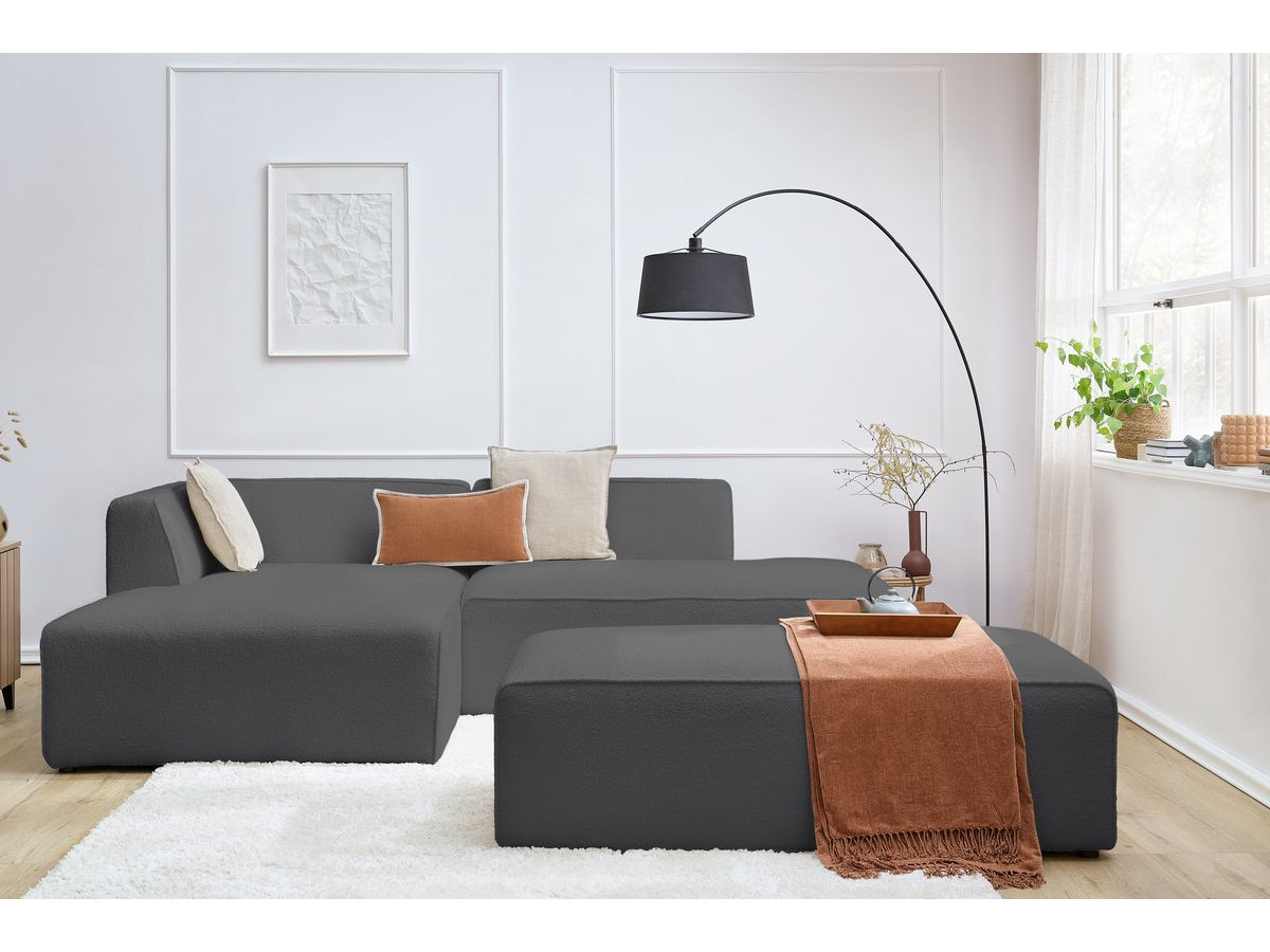 Canapé d'angle fixe modulable MEGEVE tissu bouclette avec pouf