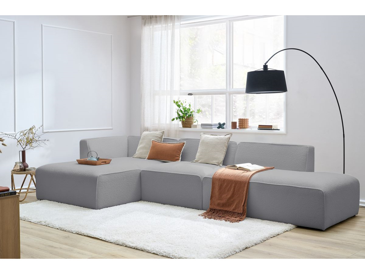 Canapé d'angle fixe modulable MEGEVE tissu bouclette avec 1 chauffeuse et 1 pouf