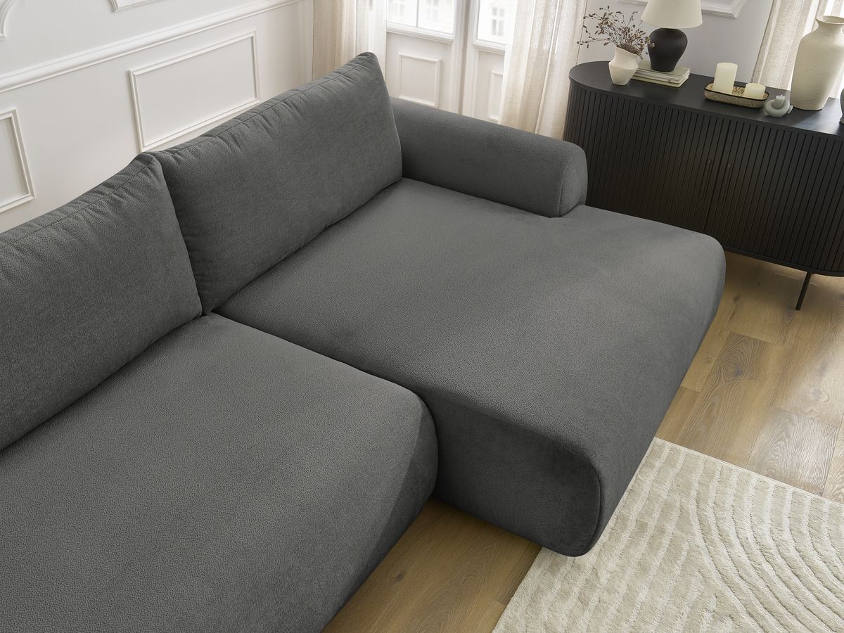 LUCIEN omvormbare hoekbank met opbergvak, gladde stof en poef