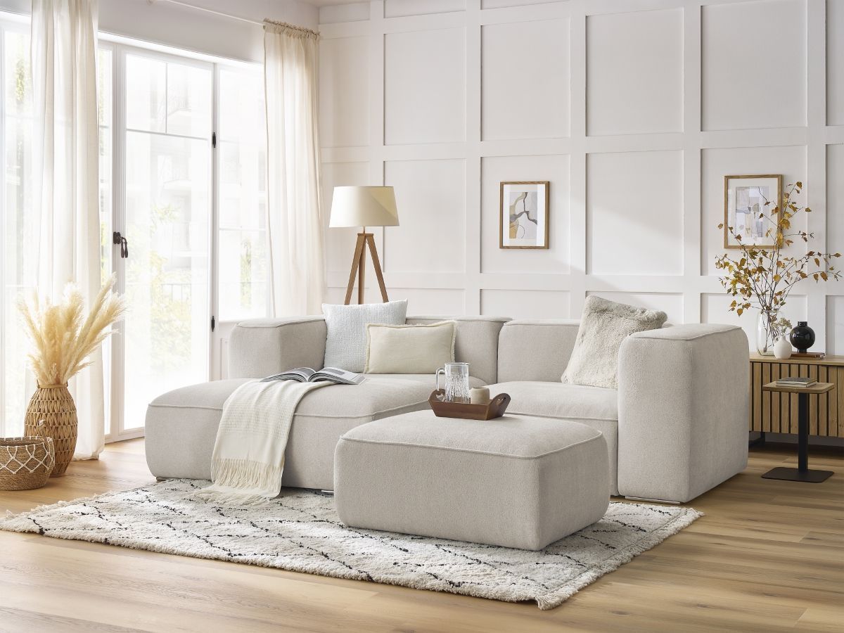 Canapé d'angle fixe compact ZEPHYR avec pouf