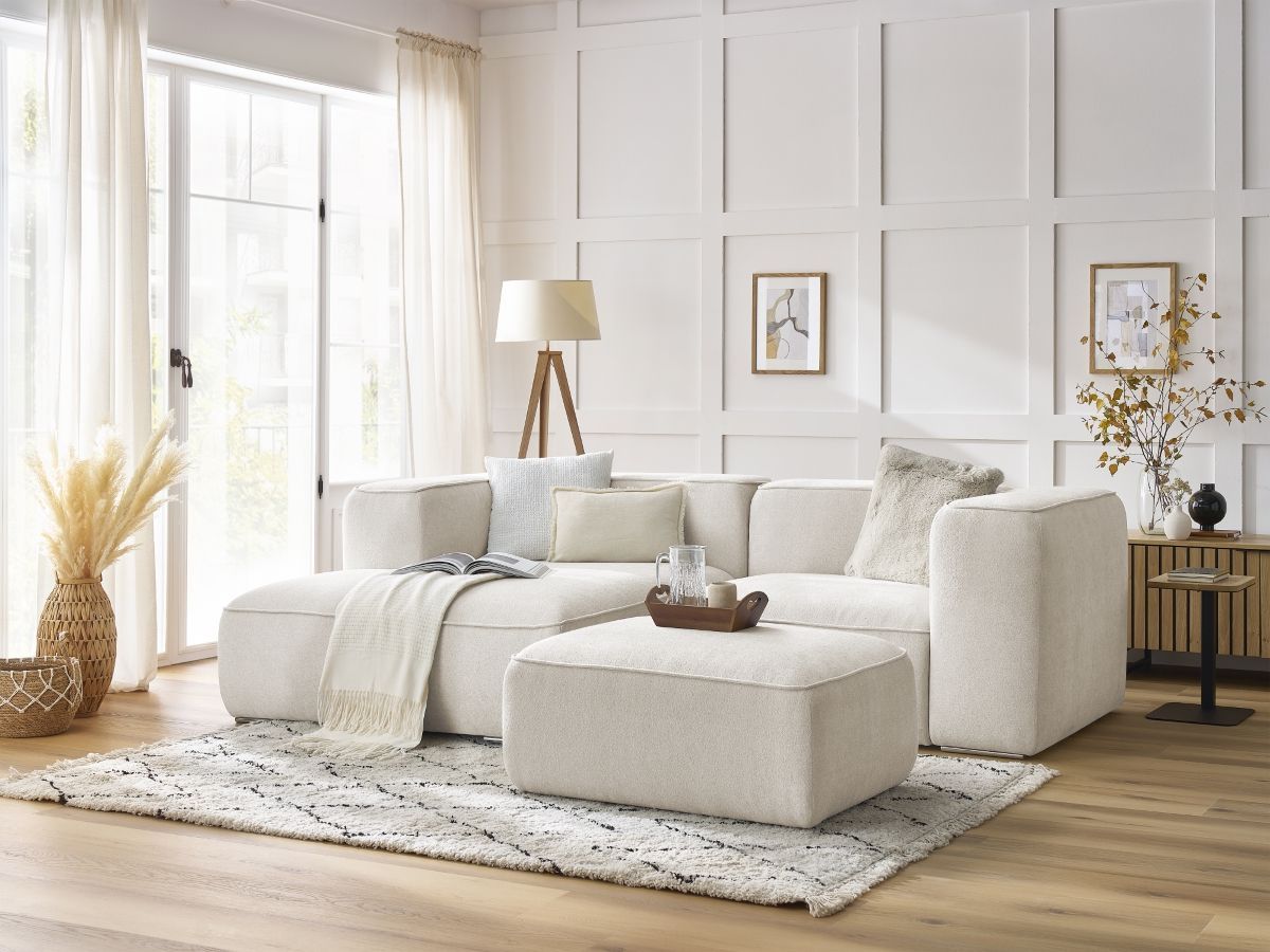 Canapé d'angle fixe compact ZEPHYR avec pouf