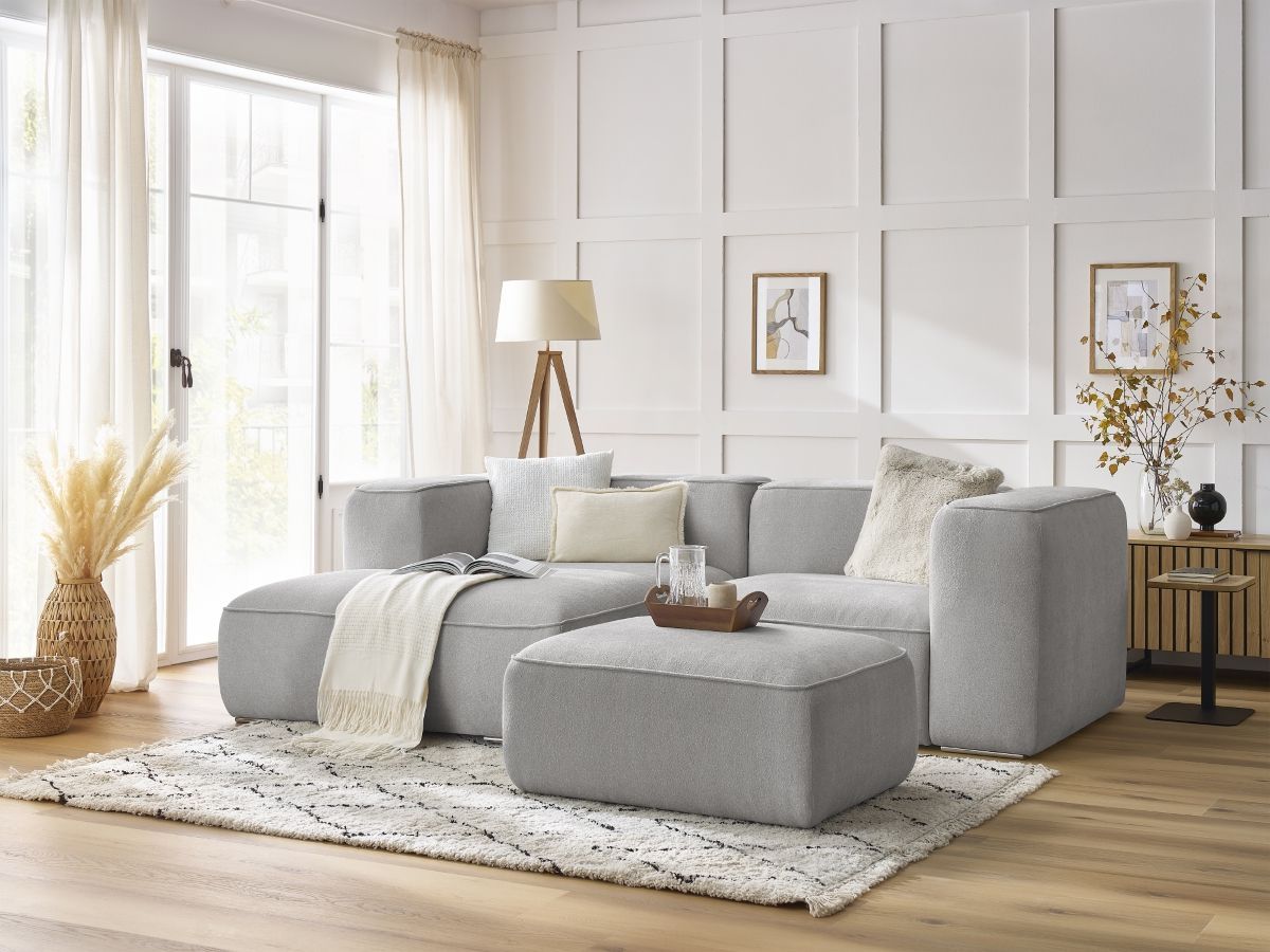 Canapé d'angle fixe compact ZEPHYR avec pouf