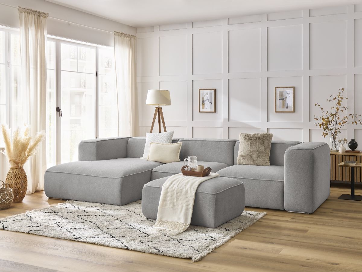 Canapé d'angle fixe ZEPHYR avec pouf gris clair angle gauche BOBOCHIC 5 places