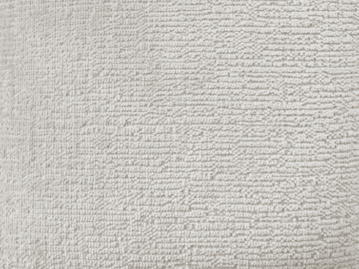 Gros plan sur la texture du tissu du canapé Whesley, trame visible en détail