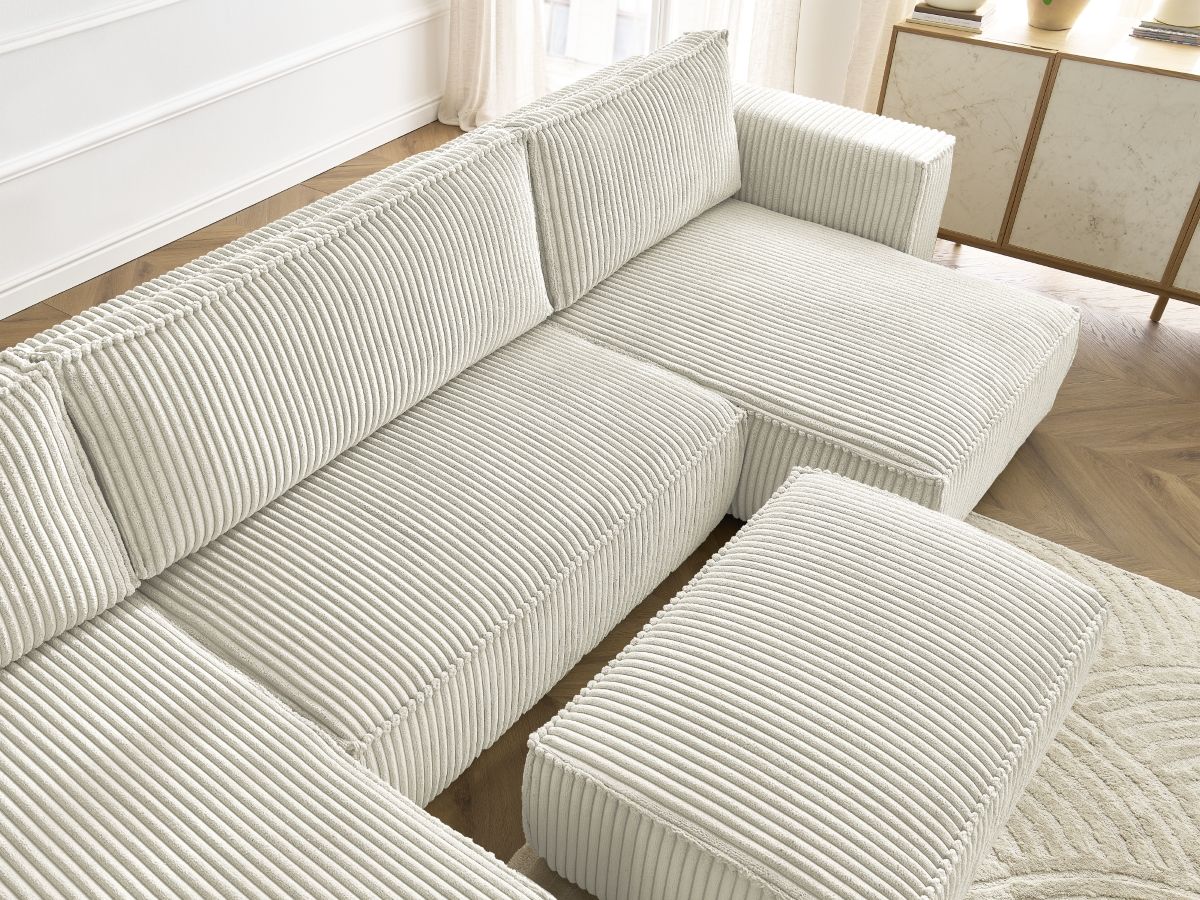 Canapé panoramique convertible coffre CHELSEA gros côtelé doux avec pouf