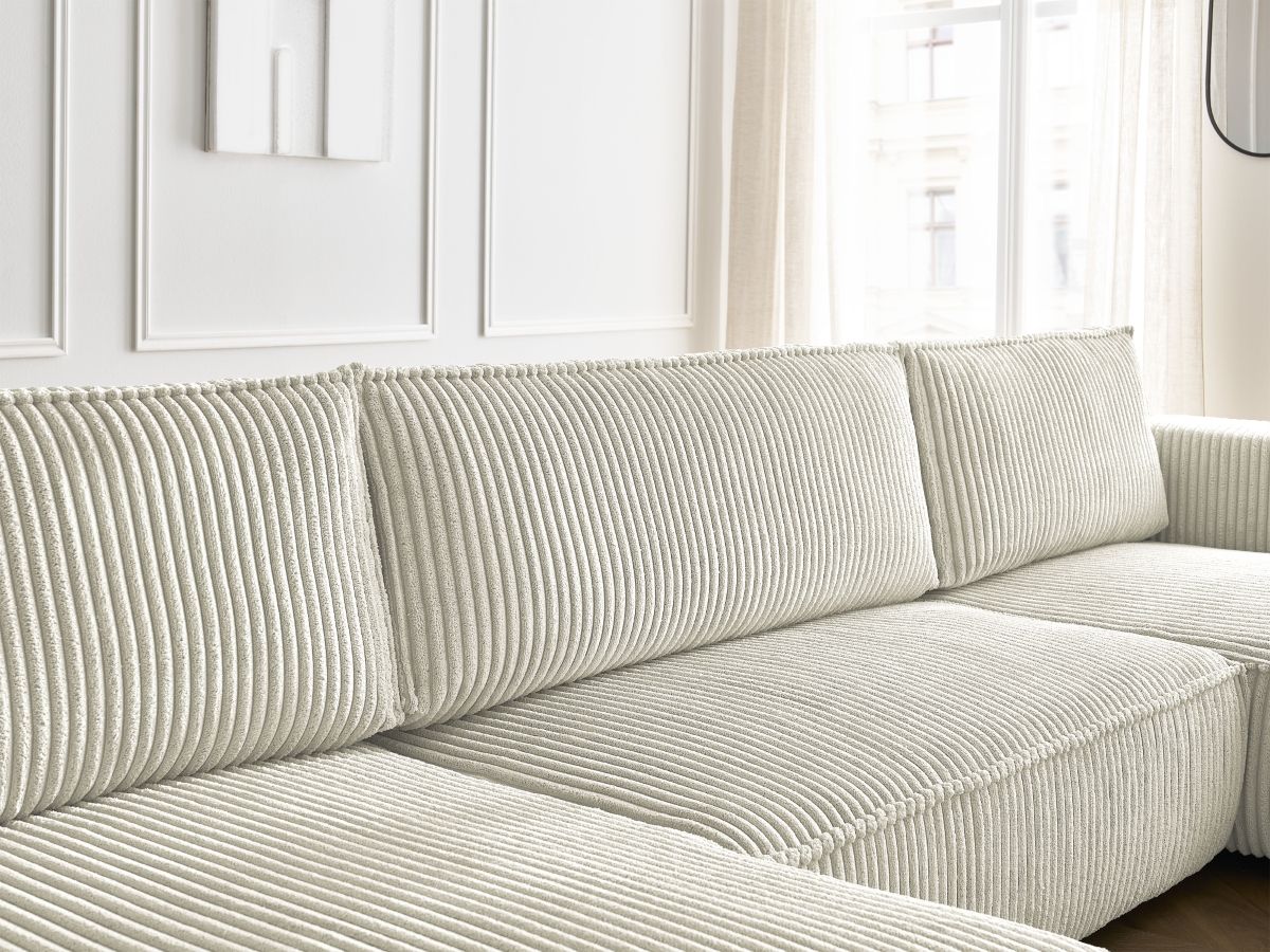 Canapé panoramique convertible coffre CHELSEA gros côtelé doux avec pouf