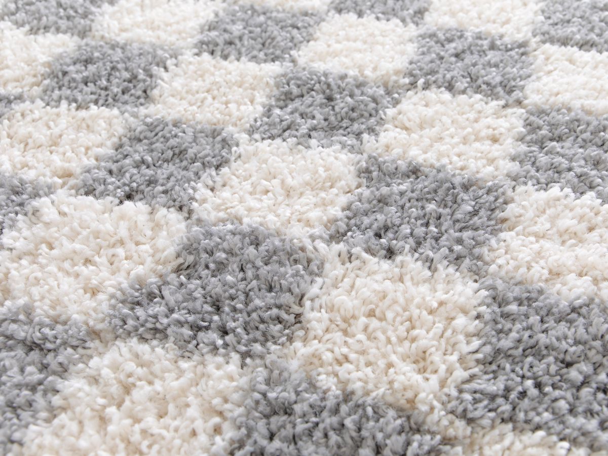 DAMIEN langpolig vloerkleed met schaakbordpatroon