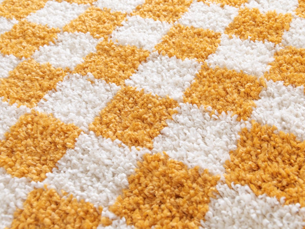 DAMIEN langpolig vloerkleed met schaakbordpatroon