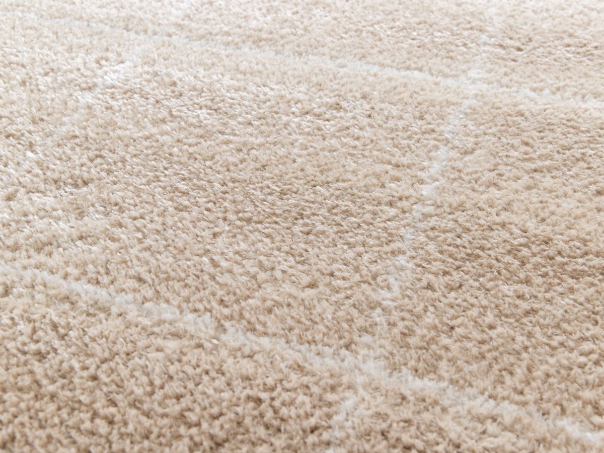 HECTOR langpolig vloerkleed met grafische patronen