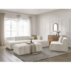 Canapé modulable ANNECY en tissu bouclette avec chauffeuse et pouf dans un salon japandi
