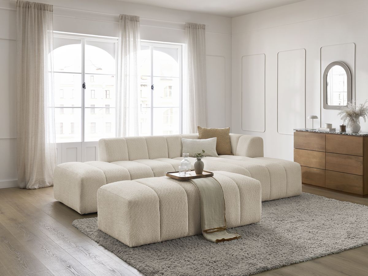 Canapé d'angle fixe modulable ANNECY tissu bouclette avec pouf