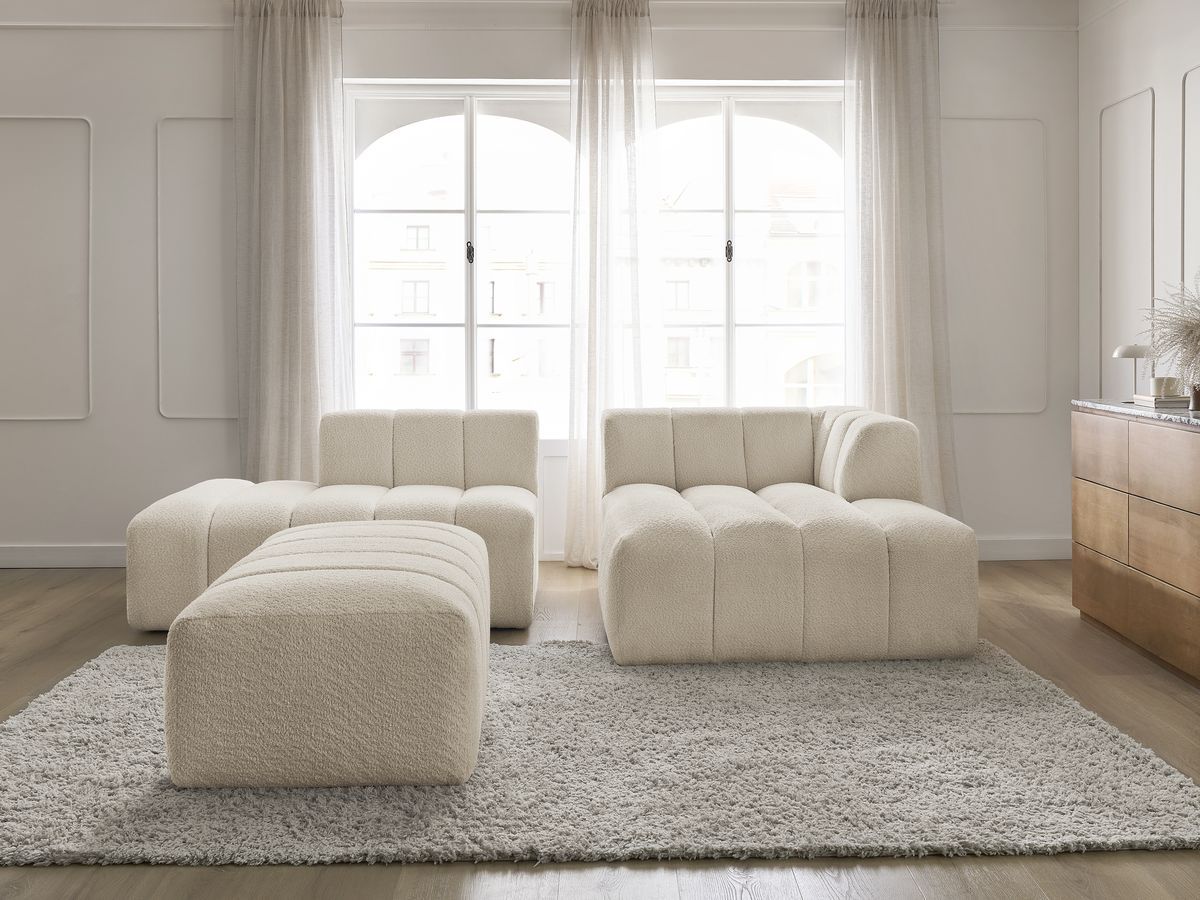 Canapé d'angle fixe modulable ANNECY tissu bouclette avec pouf