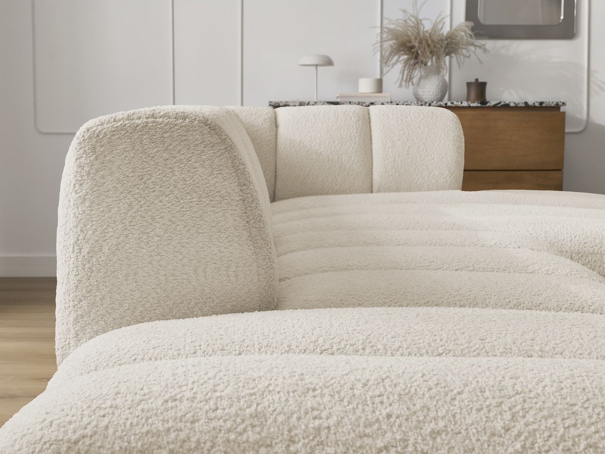 Canapé d'angle fixe modulable ANNECY tissu bouclette avec pouf