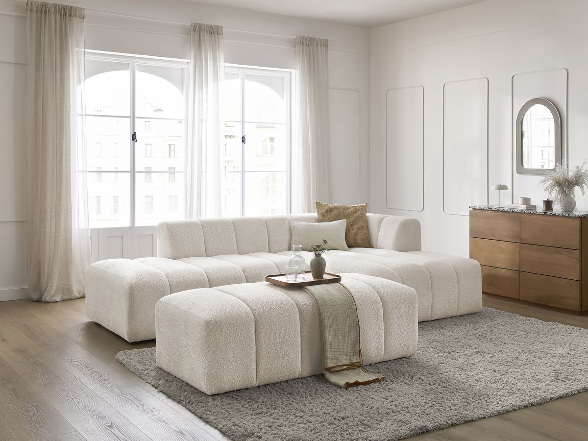 Canapé d'angle fixe modulable ANNECY tissu bouclette avec pouf