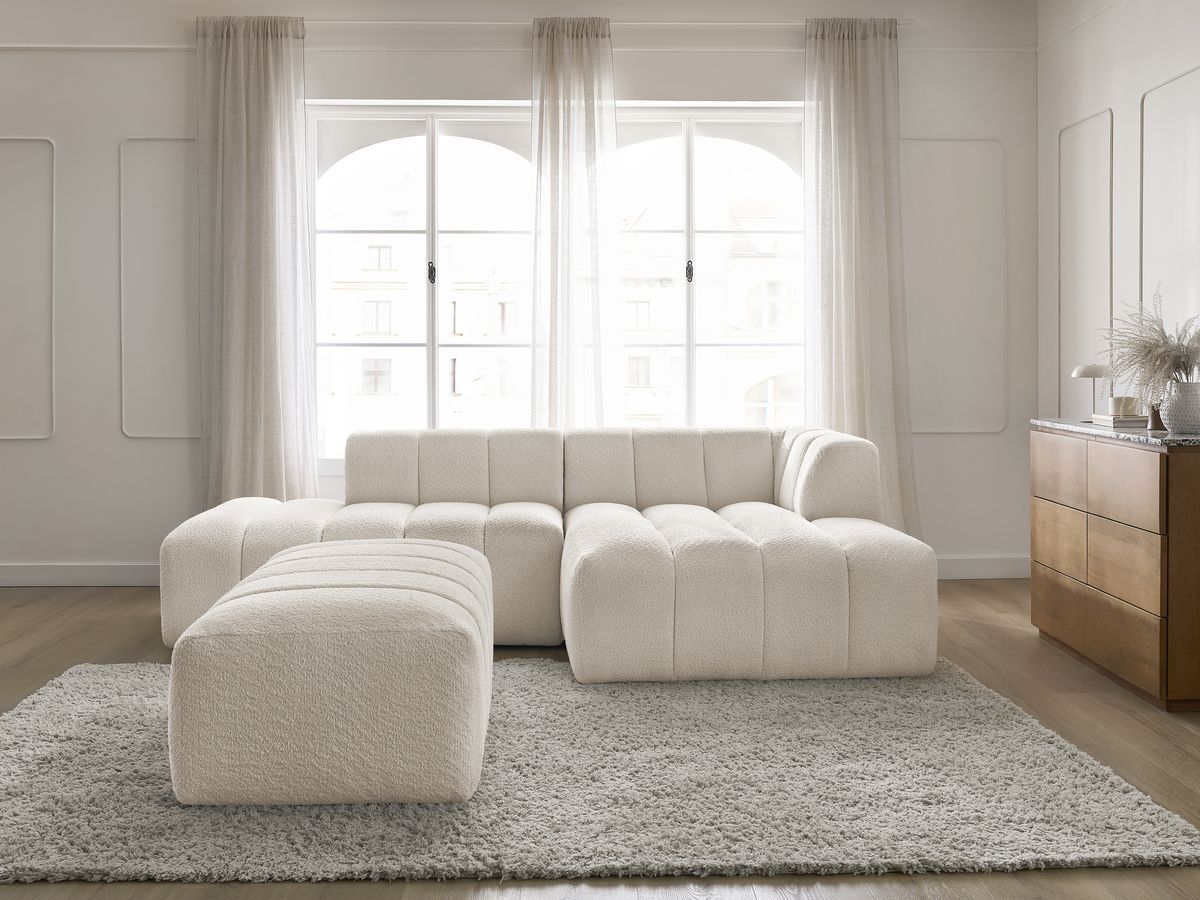 Canapé d'angle fixe modulable ANNECY tissu bouclette avec pouf