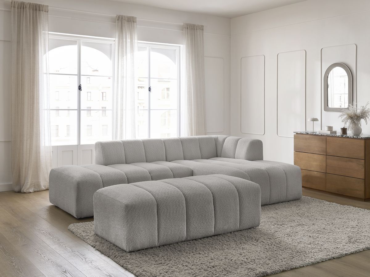 Canapé d'angle fixe modulable ANNECY tissu bouclette avec pouf