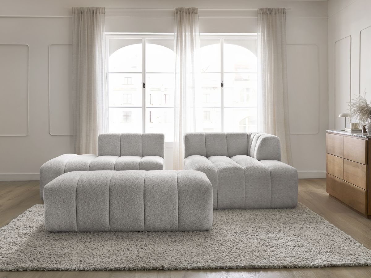 Canapé d'angle fixe modulable ANNECY tissu bouclette avec pouf