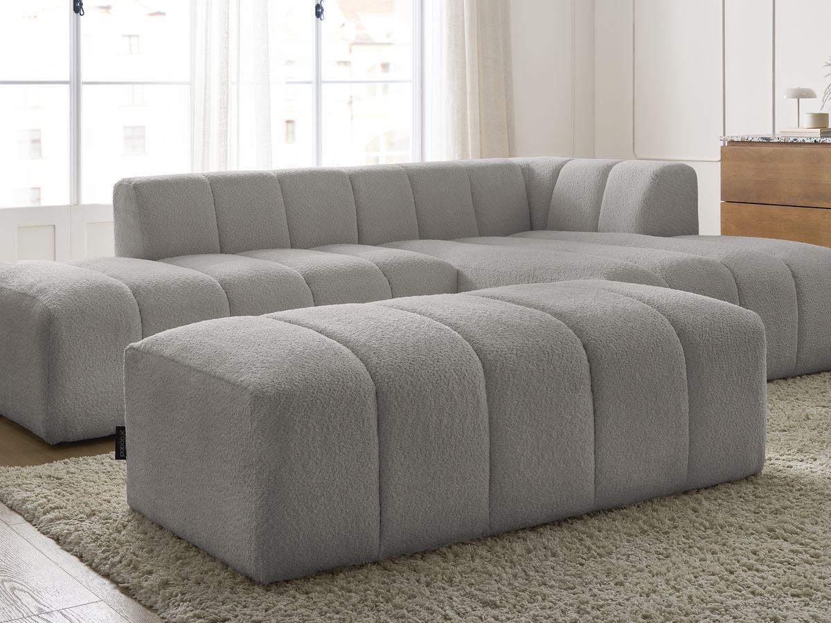 Canapé d'angle fixe modulable ANNECY tissu bouclette avec pouf