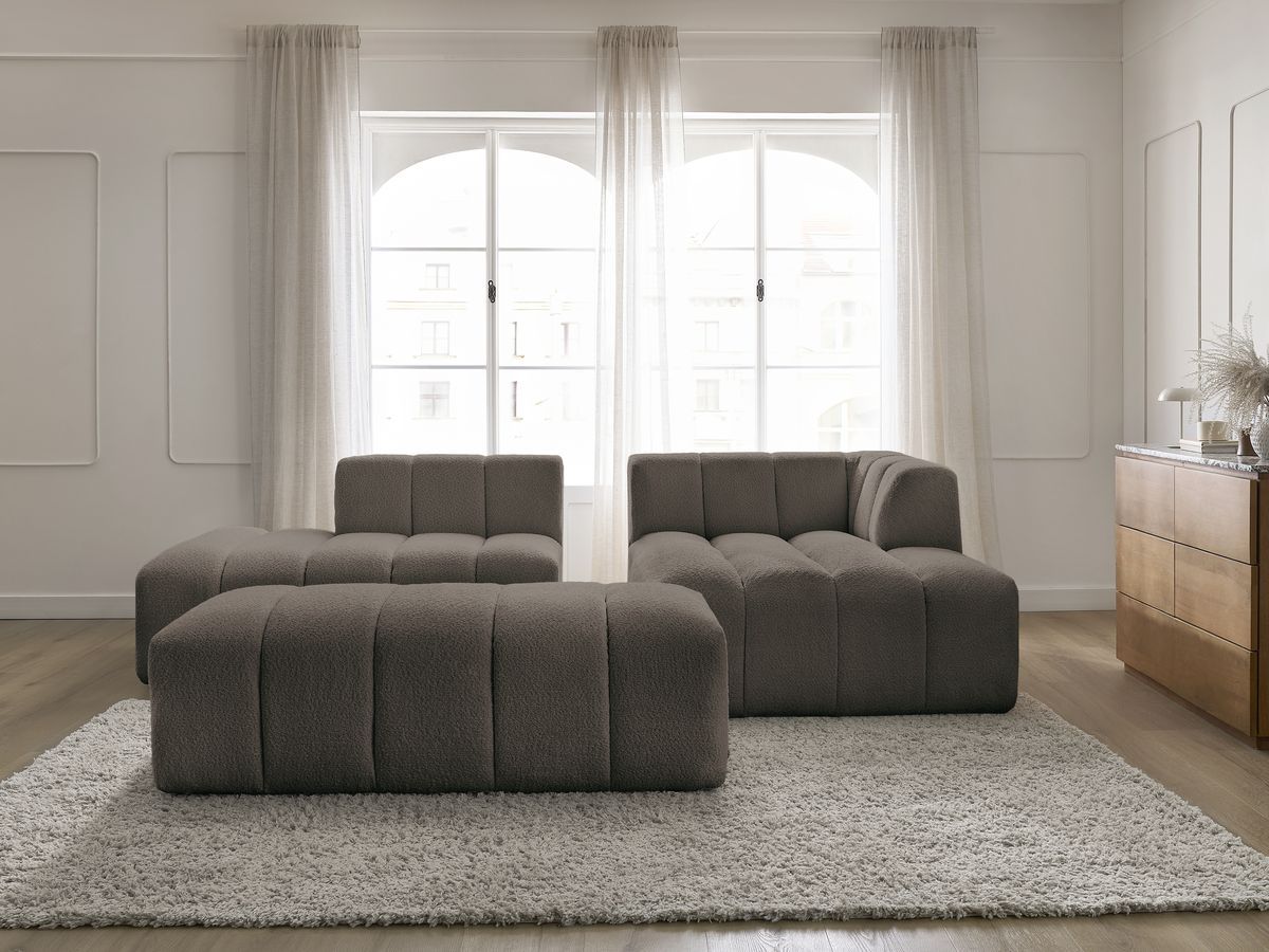 Canapé d'angle fixe modulable ANNECY tissu bouclette avec pouf