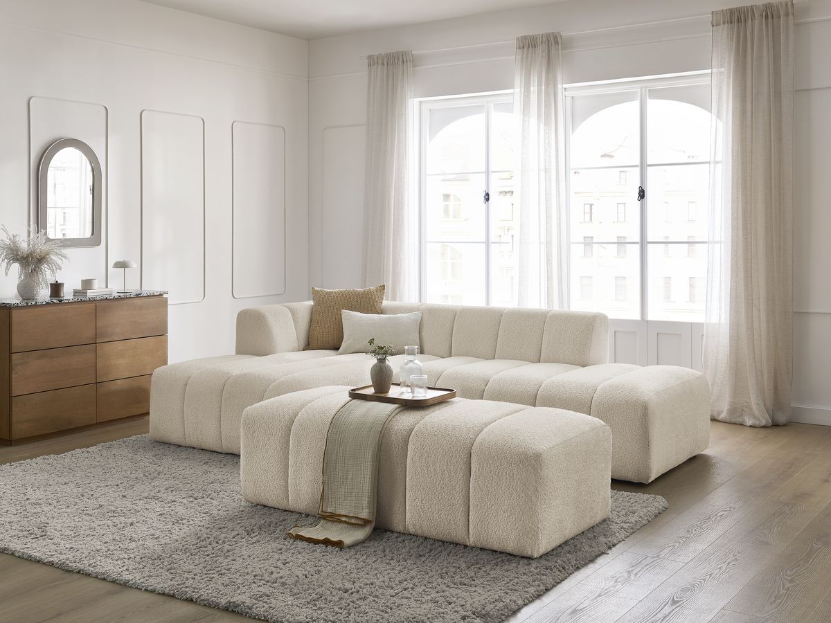 Canapé d'angle fixe modulable ANNECY tissu bouclette avec pouf