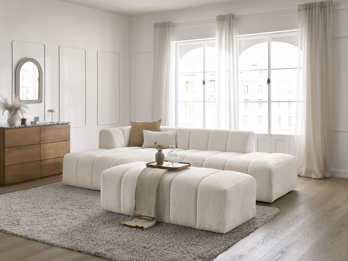 Canapé d'angle fixe modulable ANNECY tissu bouclette avec pouf