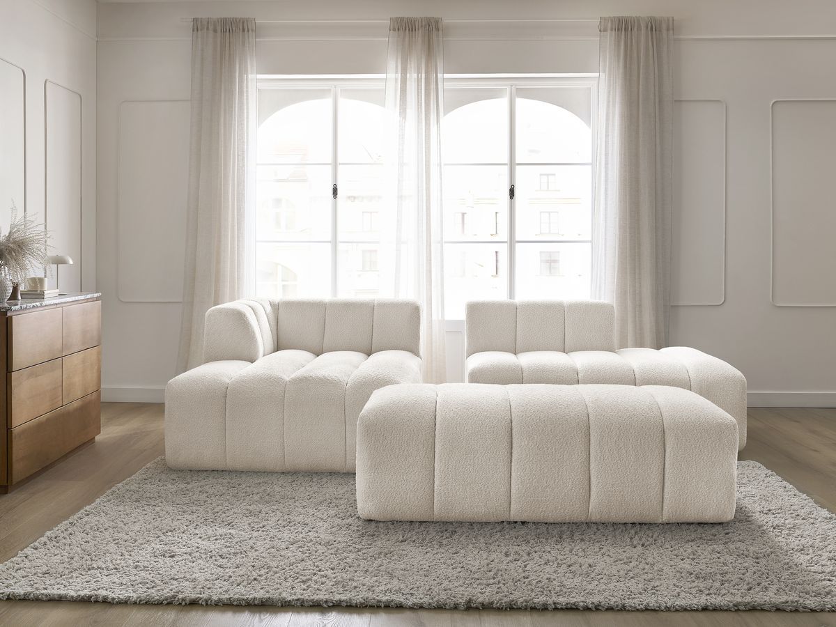 Canapé d'angle fixe modulable ANNECY tissu bouclette avec pouf