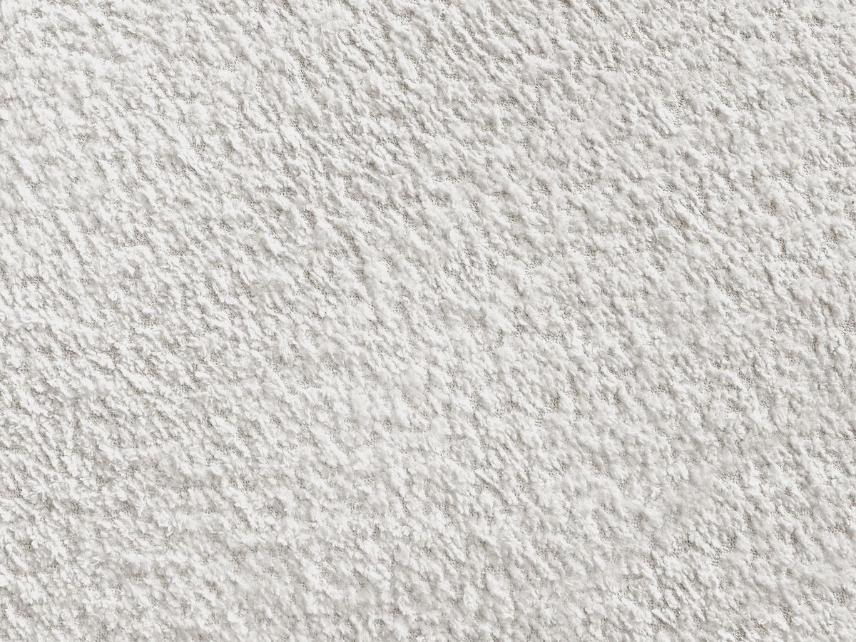 Canapé d'angle fixe modulable ANNECY tissu bouclette avec pouf