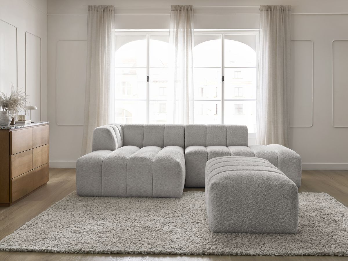 Canapé d'angle fixe modulable ANNECY tissu bouclette avec pouf