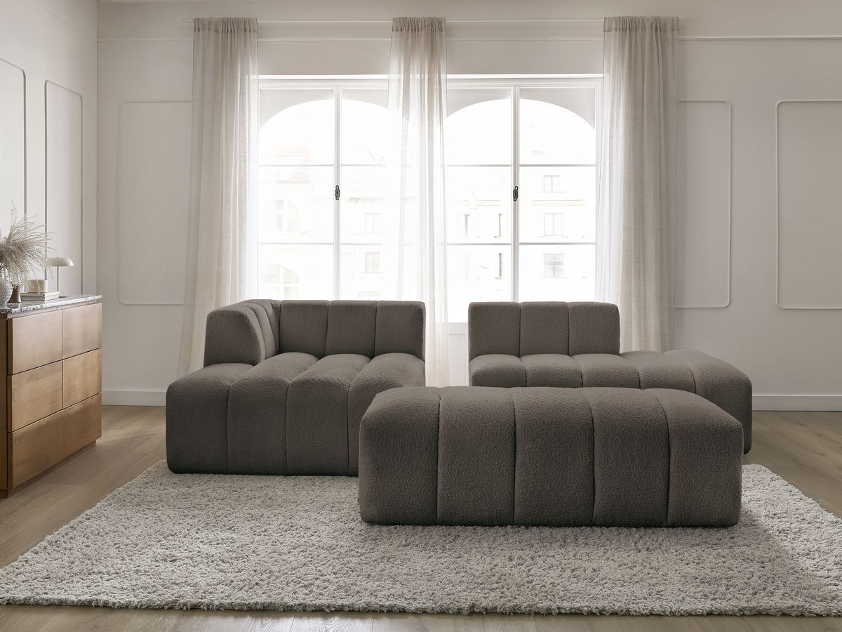 Canapé d'angle fixe modulable ANNECY tissu bouclette avec pouf