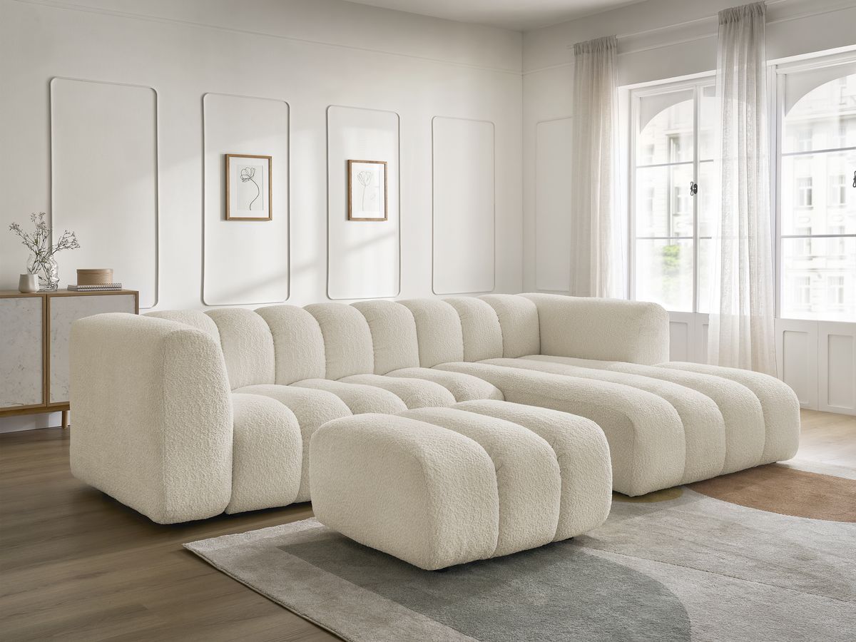 Canapé d'angle fixe TALIA tissu bouclette avec pouf