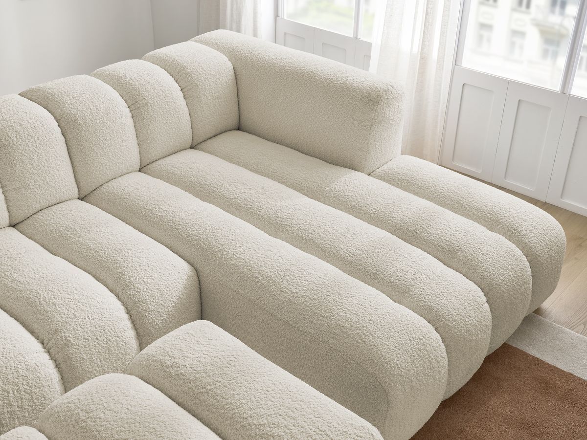 Canapé d'angle fixe TALIA tissu bouclette avec pouf