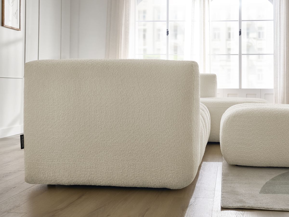 Canapé d'angle fixe TALIA tissu bouclette avec pouf
