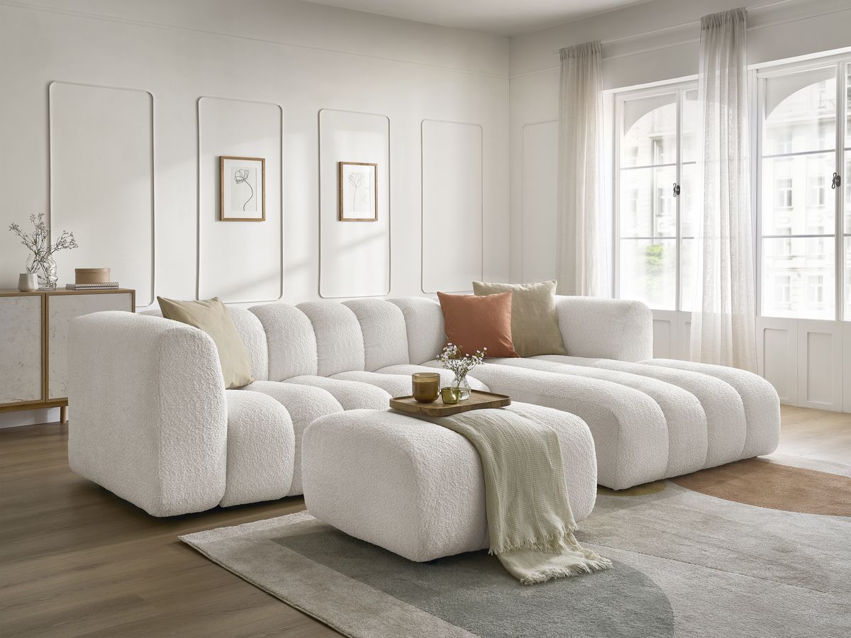Canapé d'angle fixe TALIA tissu bouclette avec pouf