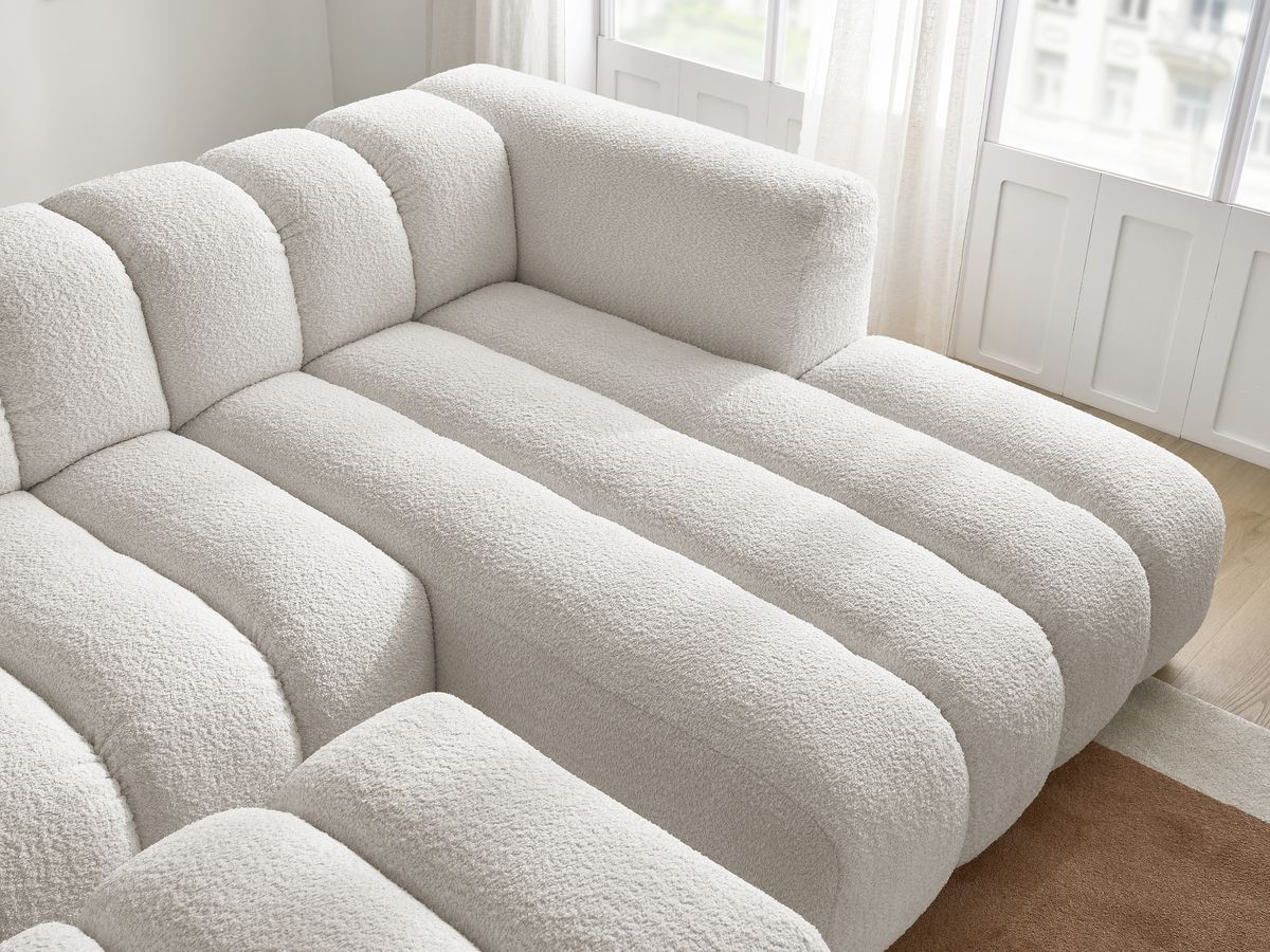 Canapé d'angle fixe TALIA tissu bouclette avec pouf
