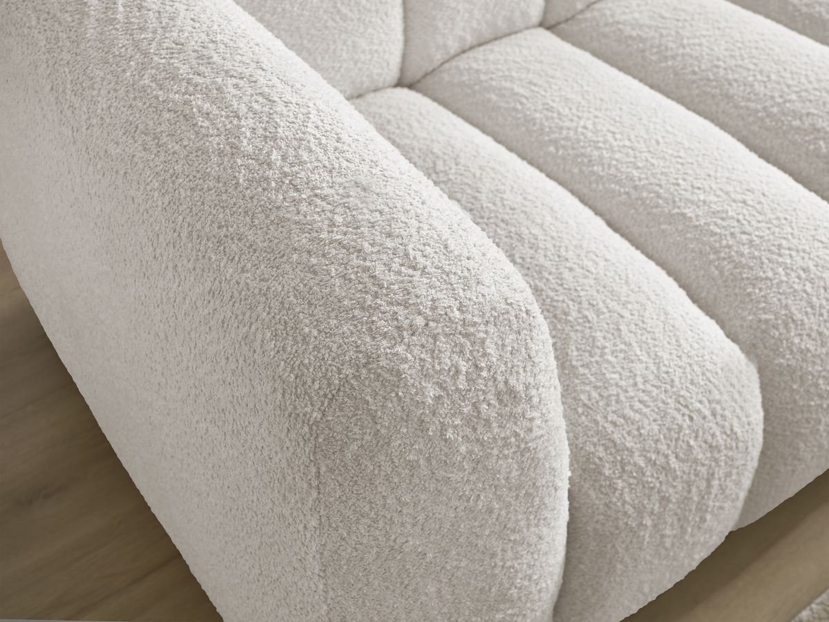Canapé d'angle fixe TALIA tissu bouclette avec pouf