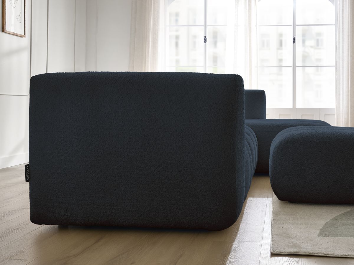 Canapé d'angle fixe TALIA tissu bouclette avec pouf