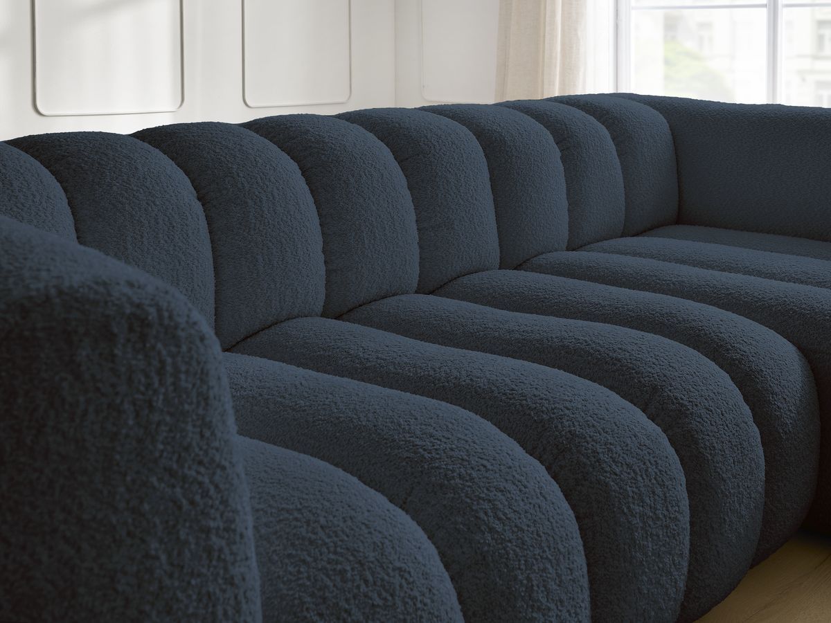 Canapé d'angle fixe TALIA tissu bouclette avec pouf