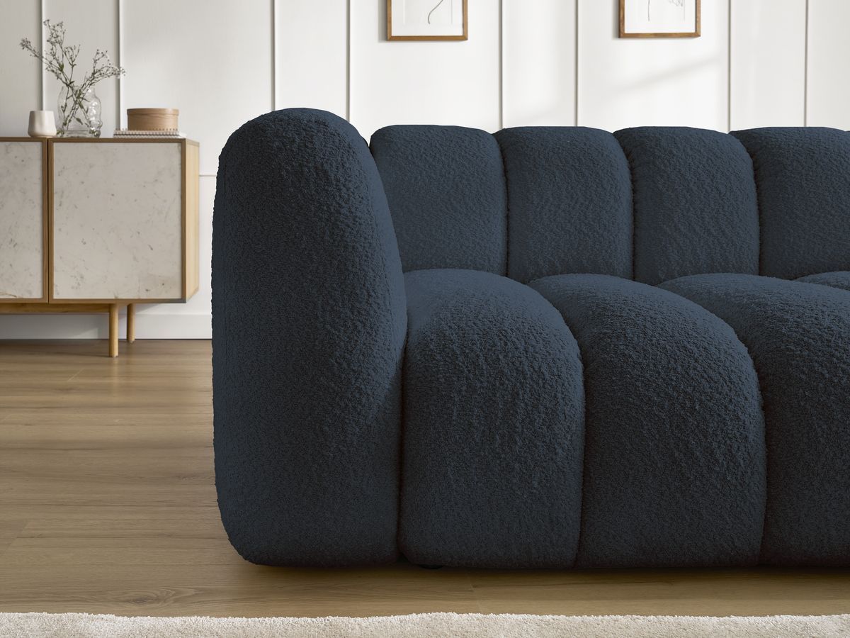 Canapé d'angle fixe TALIA tissu bouclette avec pouf