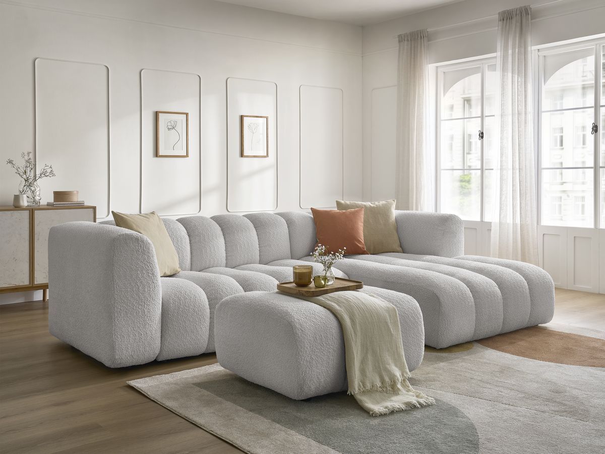 Canapé d'angle fixe TALIA tissu bouclette avec pouf